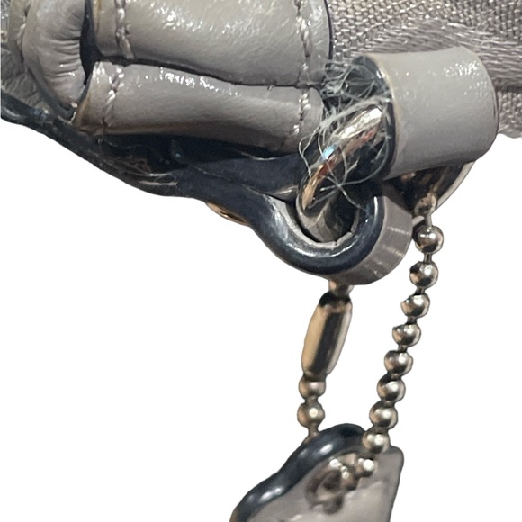 Grey cloth coach wristlet with leather accents and strap. Silver color. - Picture 7 of 11
